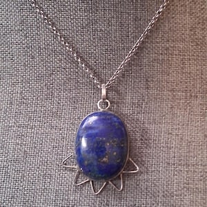Lapis lazuli oval sterling silver bezel-set pendant necklace with zig zag design 16"