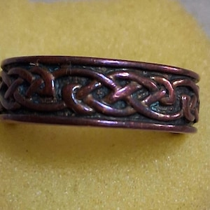 Copper Celtic knot infinity band ring. Unisex. Symbolic, eternity and unity. Traditional Irish design.  Size 9