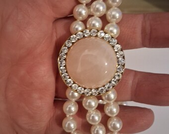 Triple strand glass faux pearl necklace w/round rose quartz cabochon & crystals/rhinestones and matching earrings, individually hand knotted