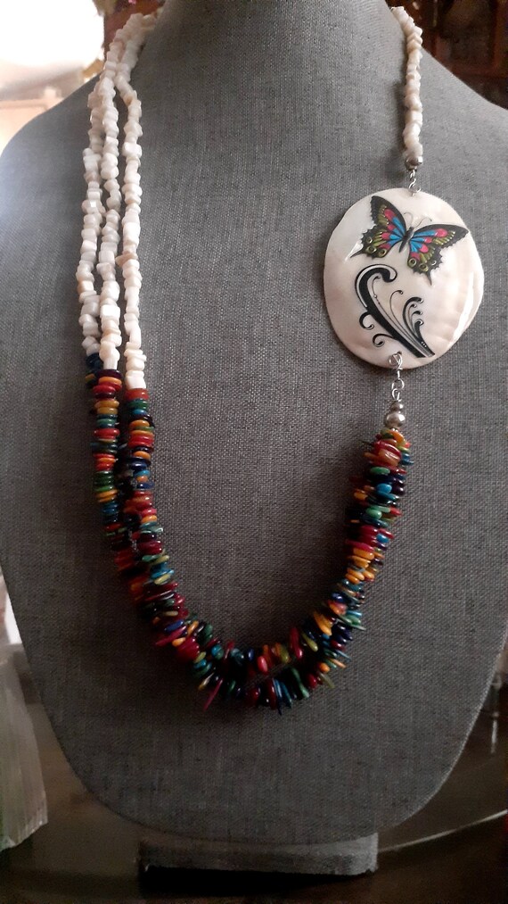 Multi strand puka shell multi color shell necklac… - image 1