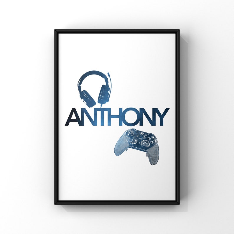 May include: A white poster with a black frame featuring a blue and black illustration of a gaming headset and a video game controller. The name "ANTHONY" is printed in blue and black letters.
