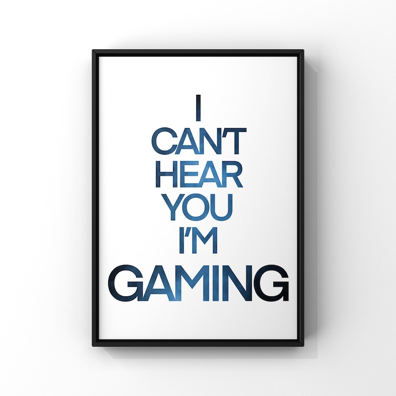 May include: A black framed poster with white background and blue text that reads "I can't hear you I'm gaming".