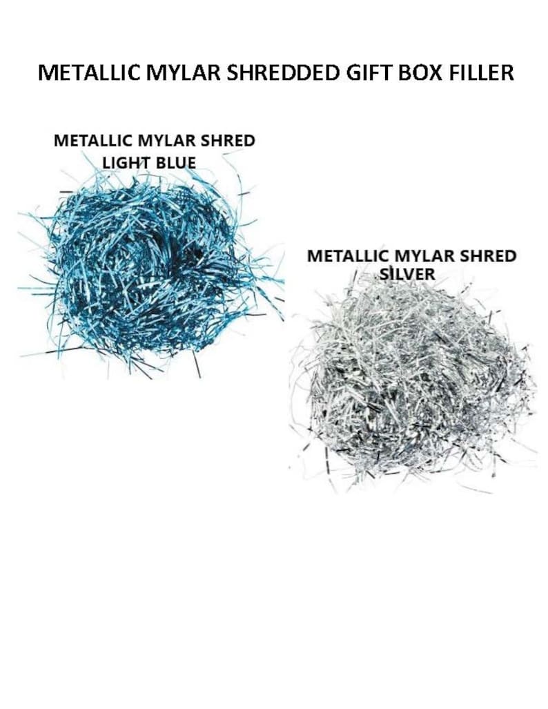 May include: Two piles of metallic shredded gift box filler. One pile is light blue and the other is silver.