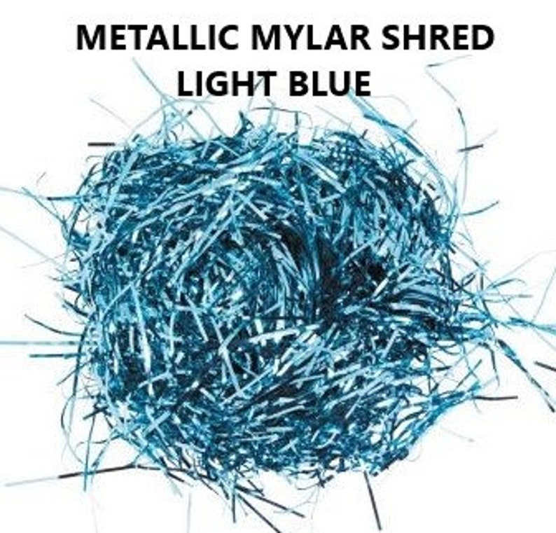 May include: Light blue metallic mylar shred for gift wrapping or crafts.