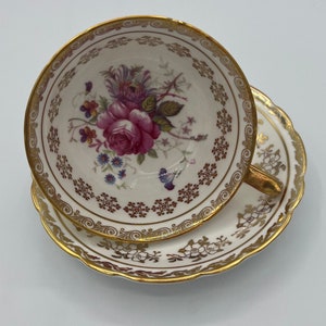 Paragon Teacup and Saucer with Gold Design and a  Floral Center Teacup | Floral Teacup and saucer | Bone China | made in England | Gold