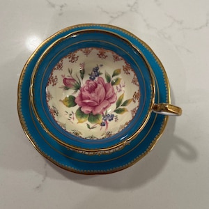 Aynsley Teacup and Saucer with floating pink rose and heavy gold trim| Turquoise Teacup and Saucer made in England | Bone China Teacup