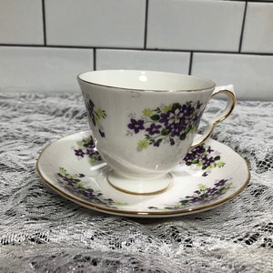 Queen Anne Purple Floral Pattern Fine Bone China Teacup and matching Saucer