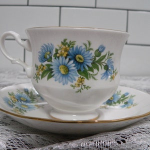 Queen Anne Blue Floral Pattern Fine Bone China Teacup and matching Saucer