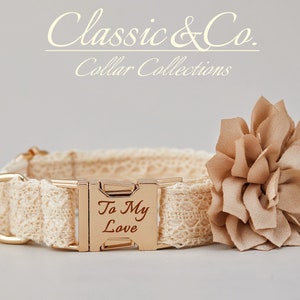 May include: A beige lace dog collar with a gold buckle engraved with "To My Love". A beige fabric flower is attached to the collar.