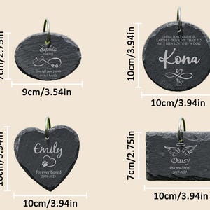 May include: Four slate pet memorial tags with silver metal loops. The tags are oval, round, heart, and rectangular, each engraved with a pet's name, dates, and a sentimental message. The tags measure 9cm to 10cm wide and 7cm to 10cm tall.