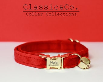May include: Red velvet cat collar with a gold buckle and a bell. The buckle is engraved with the name "Nala" and the phone number "123-456-7890".