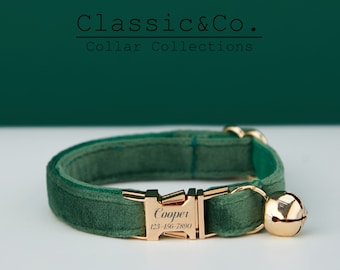 May include: A green velvet cat collar with a gold buckle and bell. The buckle is engraved with the name "Cooper" and the phone number "123-456-7890".