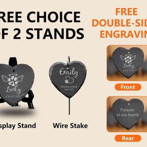 May include: Heart-shaped slate pet memorial with options for a display stand or wire stake. The memorial features double-sided engraving with a paw print design, the name "Lucky", and dates. The text "Free Choice of 2 Stands" is also visible.