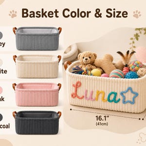 May include: A rectangular storage basket with ribbed fabric sides and brown faux leather handles. The white version features the name Luna and a star in colorful yarn. Dimensions are 16.1 inches by 12.2 inches by 8 inches. Available in grey, white, pink, and charcoal.