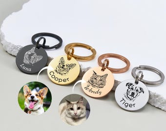 May include: Four personalized pet ID tags with engraved names and images of pets. The tags are silver, gold, and rose gold with black engraved images. The names on the tags are Luna, Cooper, Wendy, and Tiger.