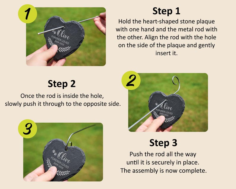 May include: A heart-shaped black stone plaque engraved with the name "Olive" and the text "Forever Loved 2009-2023". A metal rod is inserted into the plaque. Assembly instructions are shown.