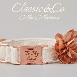 May include: A white dog collar with a rose gold buckle and a matching rose gold D-ring. The buckle is engraved with the text "To My Love". A peach-colored fabric flower is attached to the collar.