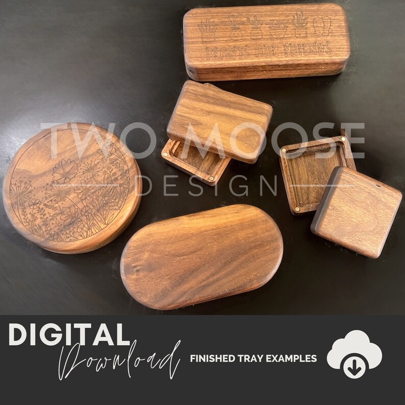 May include: A selection of wooden trays and boxes in different shapes, including round, oval, and rectangular. Some have engraved plant designs and the text "Plants are Friends." The image also shows the text "DIGITAL Download" and "FINISHED TRAY EXAMPLES."