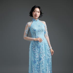 Pastel Blue Lace Ao Dai with Lotus Embroidery
