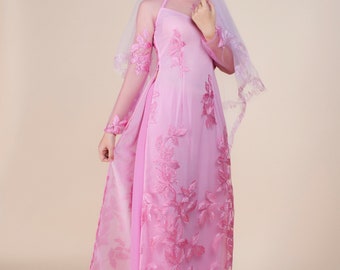 Pink ao dai. Leaf pattern lace over chiffon.