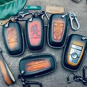 Key Fob Cover Case Leather For Bronco Sport sasquatch bucking bronco 2024 2025 Keyring Keychain Keyless Remote Holder Custom Men Women