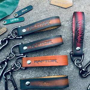 Schlüsselanhänger für Raptor Maverick Ranger Wildtrak Tremor Schlüsselanhänger Lanyard Kordel Armband Leder Anti verlorene Haken hängenden Schlüssel Fob Verschluss Clip