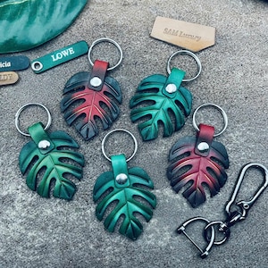 Monstera Blatt Schlüsselanhänger Leder Haken Schlüsselanhänger Tasche Brieftasche Handy Handtasche Clip Verschluss einzigartiges Geschenk Cooles Montera Schlüsselanhänger Mädchen Frauen Accessoire