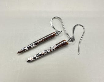 pendientes de punta moteada