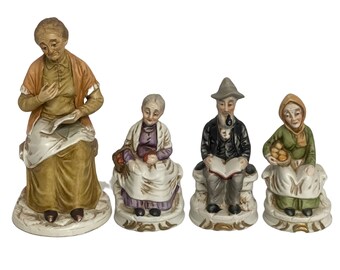 Ceramic porcelain elderly man and women on benches Figurine