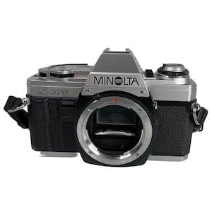 Minolta 35mm Camera X-370 SLR camera with a MD Rokkor-x 50mm 1:1.4 lens made in Japan