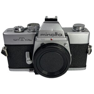 Minolta SRT101b 35mm SLR with lens