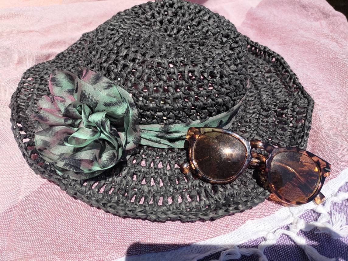 Crochet paper hat/ black sun hat/handmade straw hat/taffeta ribbon/ leopard print/ hand knitted rose trim/wide brim hat adjustable size M-L