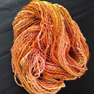Handgesponnenes Garn: 82g 12fädiges dickes dünnes Garn orange, gold pink, Merino / Bambus / Mohair / Seide