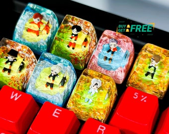 May include: Seven colorful keycaps with different cartoon characters on a red keyboard. The keycaps are translucent and have a glossy finish. The keyboard has the letters W, E, R, T, S, D, 5%, and 6 on the keys.