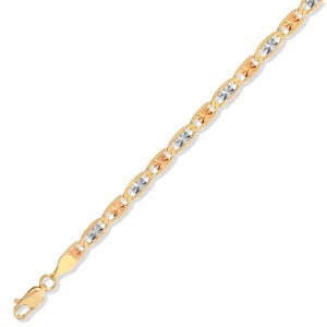May include: A gold-toned chain necklace with alternating oval links and starburst-shaped accents in gold, silver, and rose gold. The necklace has a lobster clasp closure. The jewelry is displayed against a white background.