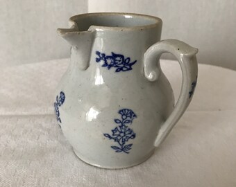 Small milk jug in St Uze stoneware, blue floral decoration, early 20th century