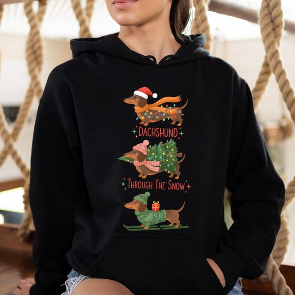 Dachshund Christmas Hoodie: Festive Wiener Dog Through the Snow Graphic