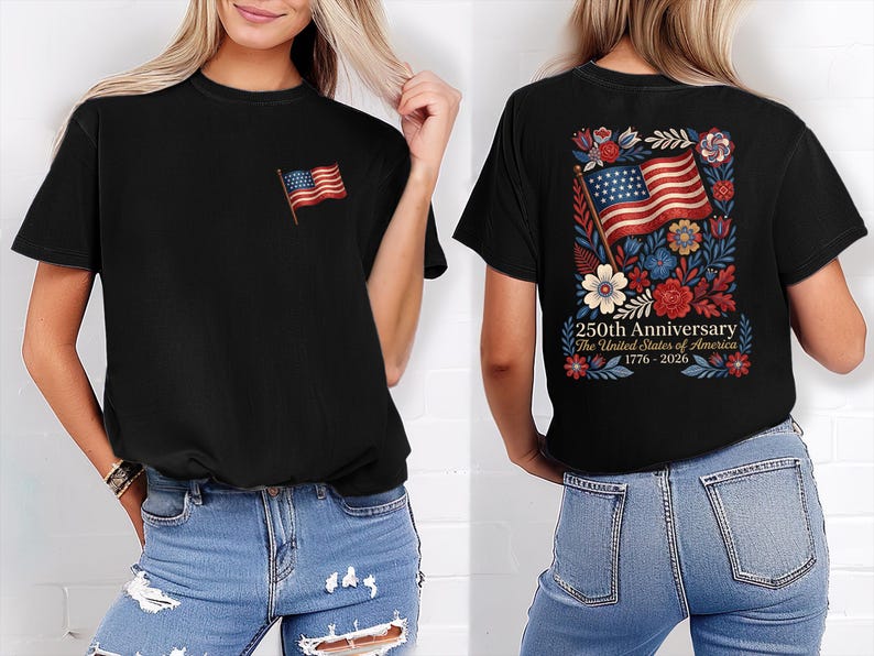 May include: Black t-shirt featuring a small American flag on the front and a larger design on the back. The back design includes an American flag, flowers, and text that reads "250th Anniversary The United States of America 1776-2026."