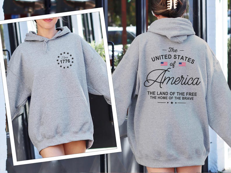Pu&ograve; includere: Una felpa con cappuccio grigio m&eacute;lange con tasca frontale e cappuccio. La parte anteriore della felpa presenta un disegno circolare con la scritta "Since 1776". Il retro della felpa mostra la scritta "The United States of America".
