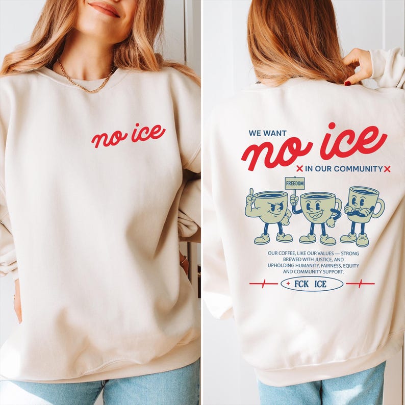 Artistic protest graphic on a sweatshirt featuring retro-style coffee mug characters standing together. The slogan No Ice in our community is prominently displayed in red. The design includes detailed text about brewing justice and community support.