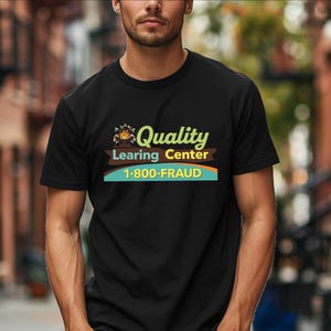 May include: Black t-shirt with the text "Quality Learing Center" in green and yellow, with a house graphic. Below the text is "1-800-FRAUD" in white text on a blue and orange background.