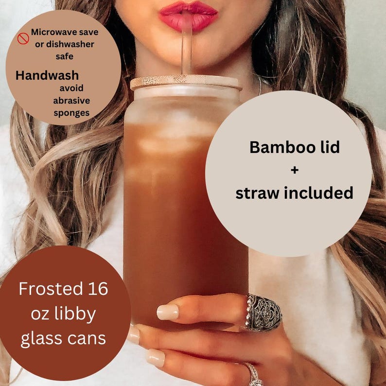 May include: Frosted 16 oz glass can with a bamboo lid and straw. The can is filled with a brown liquid. The text "Microwave save or dishwasher safe" and "Handwash avoid abrasive sponges" is visible on the left side of the image. The text "Bamboo lid + straw included" is visible on the right side of the image.