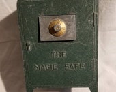 Vintage Cast Iron quot The Magic Safe quot Coin Bank