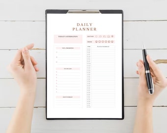 May include: A daily planner with a black clipboard, a white background, and sections for today's affirmation, top priorities, to-do list, don't forget, weather, mood, time, and plans & schedule.