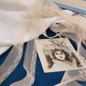 Beautiful old tulle embroidered between two ecru cotton sold by the meter