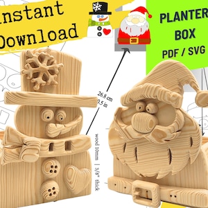 Può includere: Design di fioriere in legno con un pupazzo di neve e Babbo Natale. Il pupazzo di neve ha un cappello a fiocco di neve e dettagli di bottoni. La fioriera di Babbo Natale ha una fibbia. I testi "Instant Download" e "PLANTER BOX PDF / SVG" sono visibili.