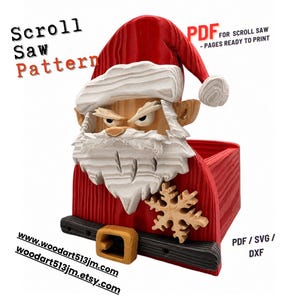 May include: A red and white wooden Santa Claus-shaped box with a carved face, beard, and hat. A snowflake and a gold buckle are on the front. Text includes "Scroll Saw Pattern" and website addresses.