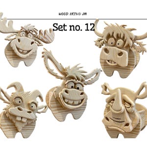 May include: Set no. 12 of whimsical wooden animal wall art. The set includes a moose, a bull, a goat, a donkey, and a rhino, all with exaggerated features and smiling expressions. The art is made of light-colored wood.