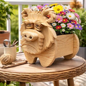 May include: A wooden dog-shaped planter filled with colorful daisies and other flowers. The planter is light brown and has a whimsical design. It sits on a round, woven table. The flowers include white, pink, purple, and yellow blooms.
