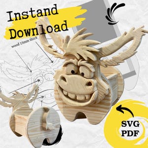 May include: A whimsical wooden sculpture of a smiling moose with large antlers. The sculpture is made of light-colored wood, with visible grain. The text "Instand Download" is in the upper left corner, and "SVG PDF" is in the lower right corner.